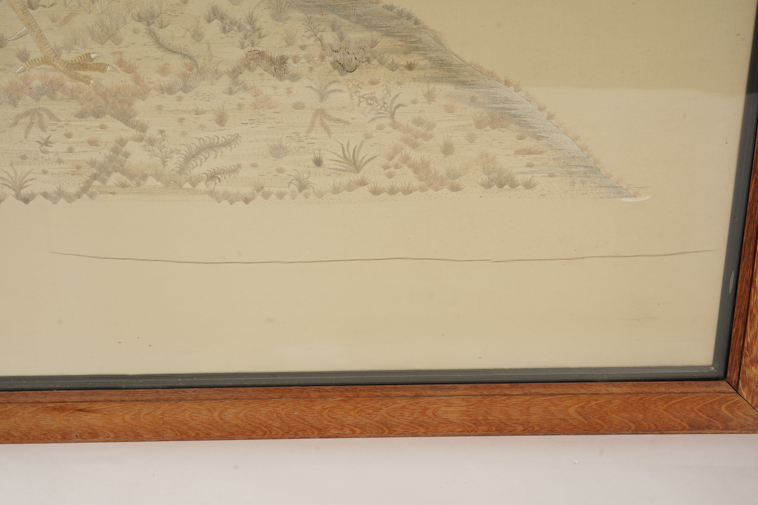 A large Japanese embroidered ‘fighting cockerels’ panel, Meiji period, signed Kawauchi, dated August 14, 1907